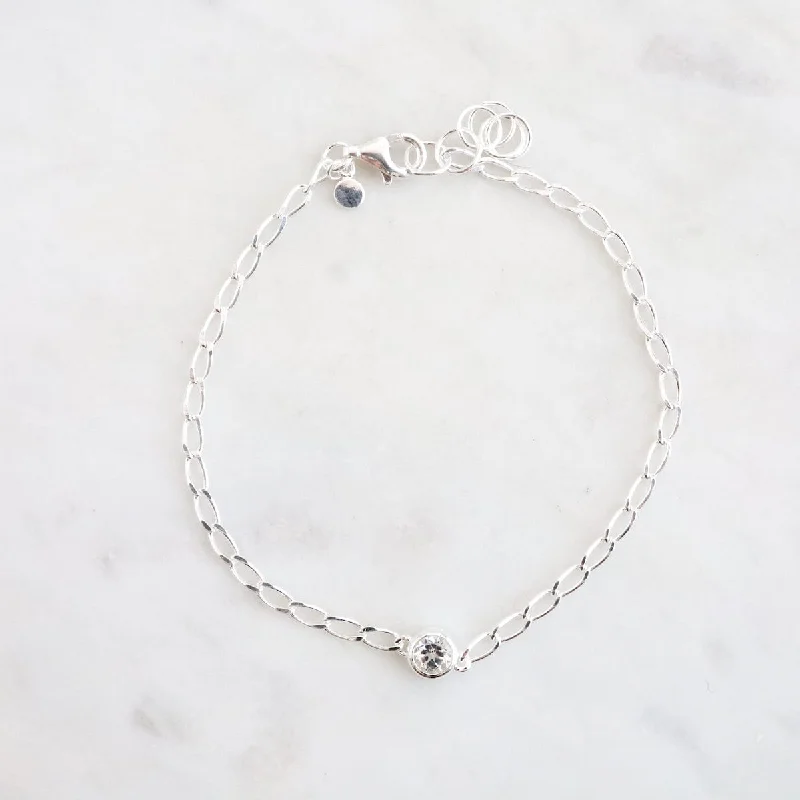 Fine Cut Curb Chain with Round Bezel Set White Topaz Bracelet